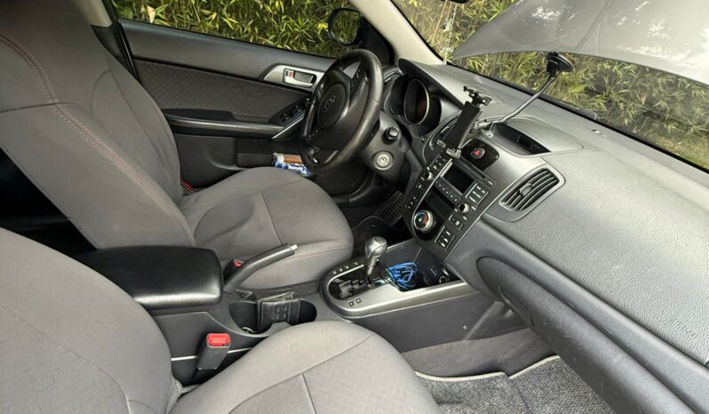 Kia Cerato 2013 lleno